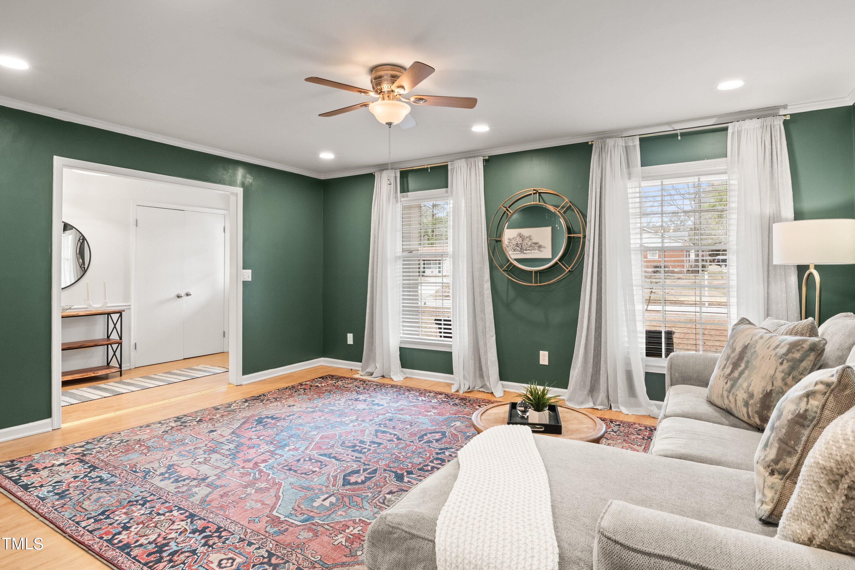 1 Kellom Court Durham, NC 27713 - Photo 11 of 33 a bedroom with a large bed and a chandelier