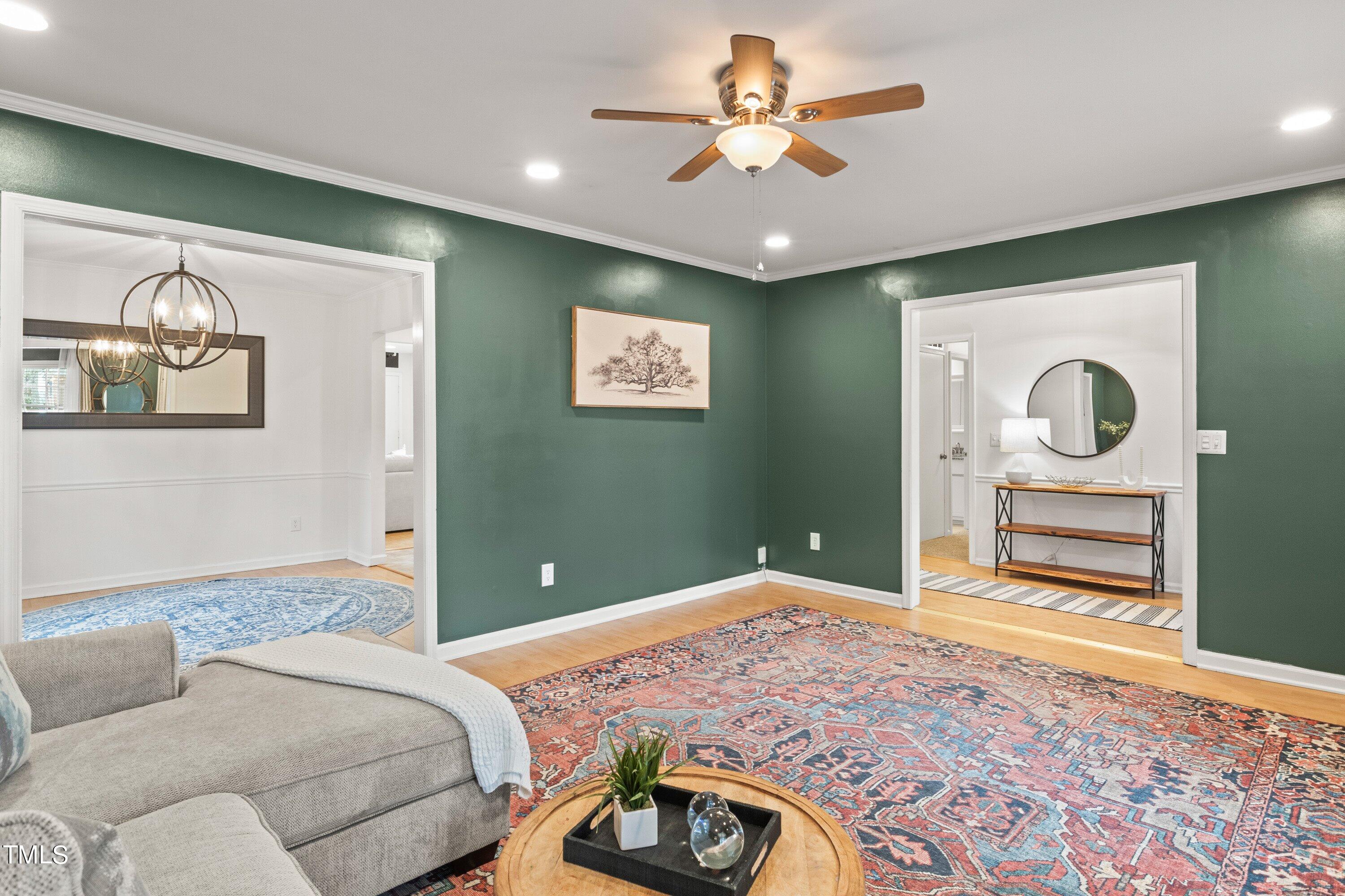 1 Kellom Court Durham, NC 27713 - Photo 12 of 33 a bedroom with a bed and a chandelier