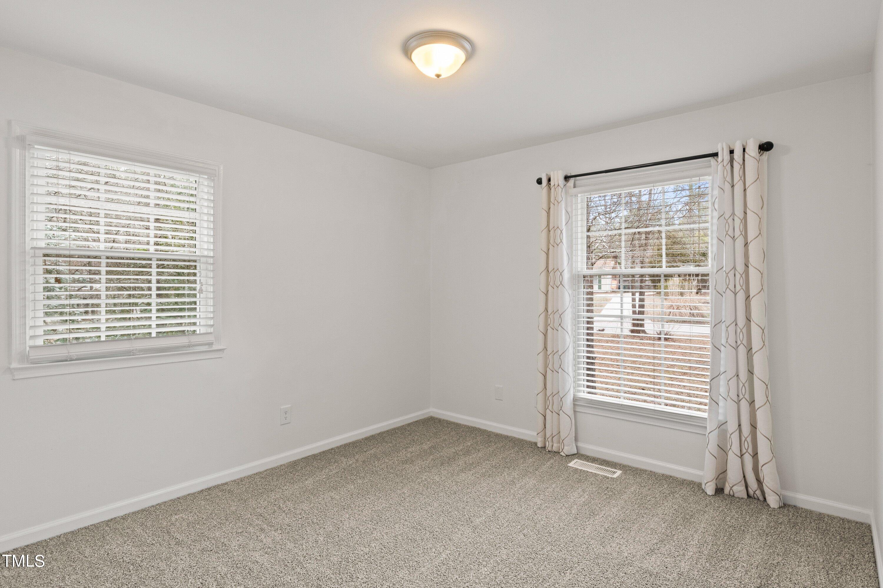 1 Kellom Court Durham, NC 27713 - Photo 22 of 33 an empty room with a window