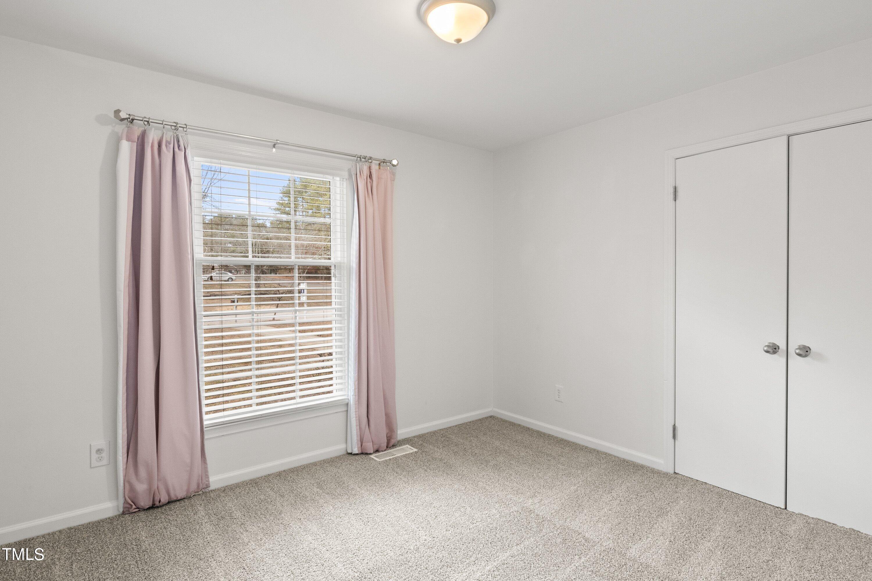 1 Kellom Court Durham, NC 27713 - Photo 24 of 33 a view of an empty room with a window