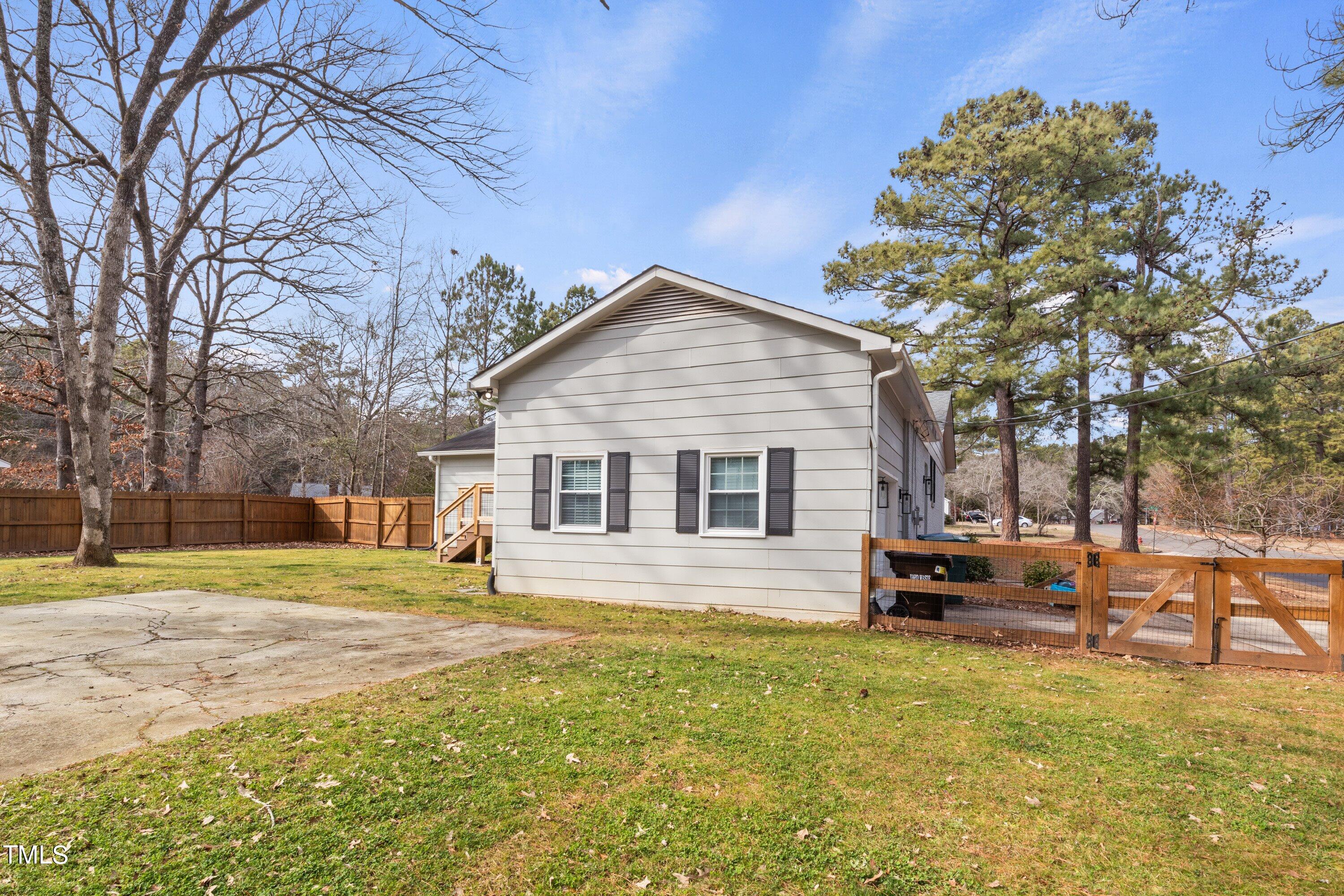 1 Kellom Court Durham, NC 27713 - Photo 29 of 33 a front view of a house with a yard
