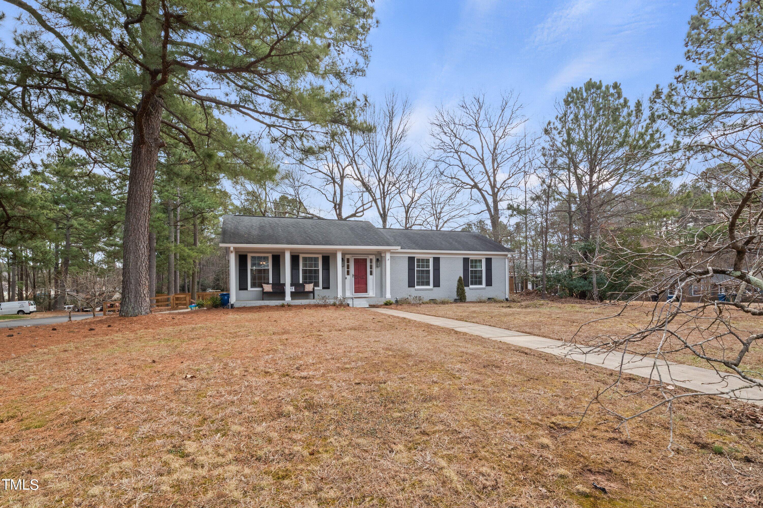 1 Kellom Court Durham, NC 27713 - Photo 5 of 33 a front view of a house with a yard