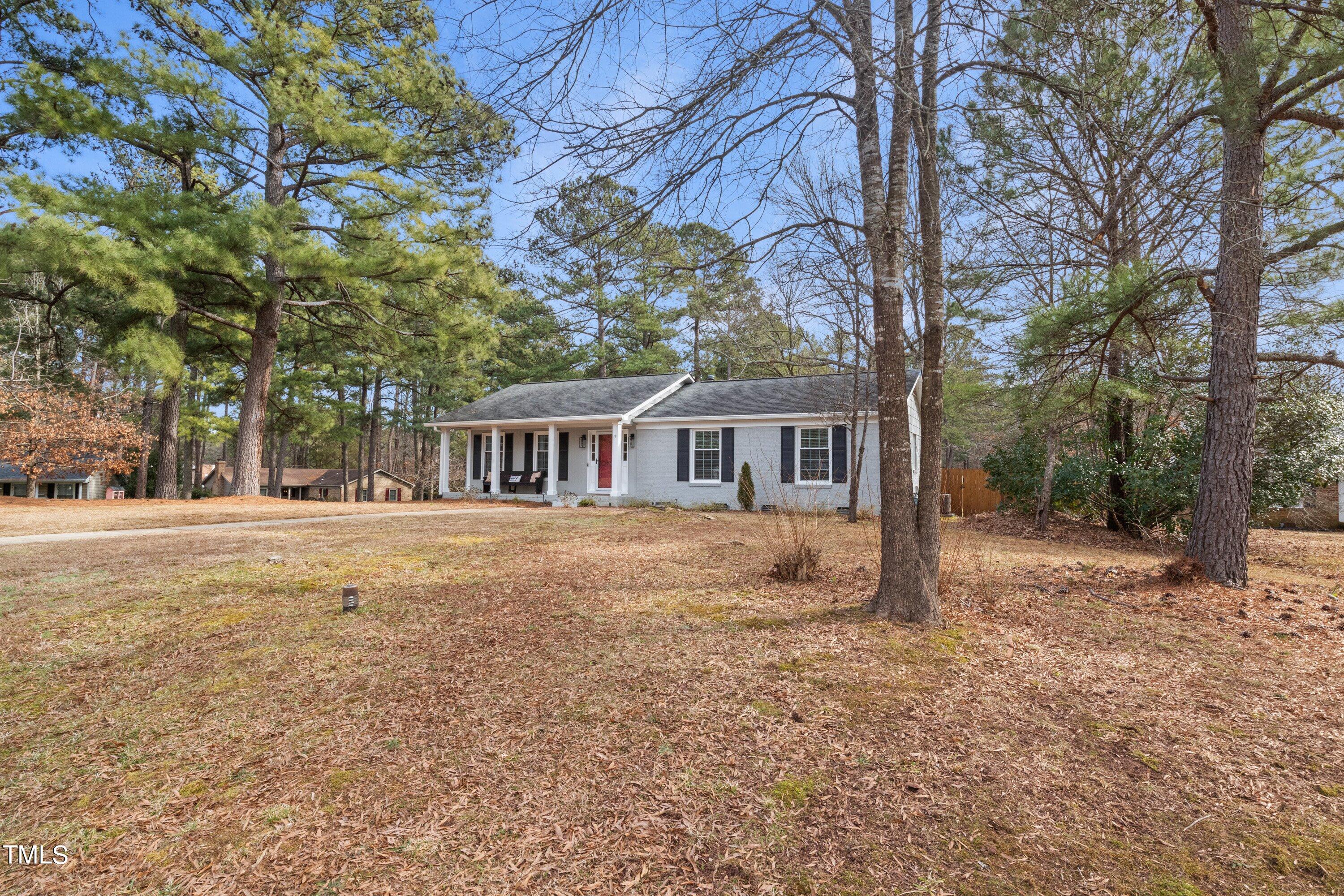 1 Kellom Court Durham, NC 27713 - Photo 7 of 33 a front view of a house with a yard