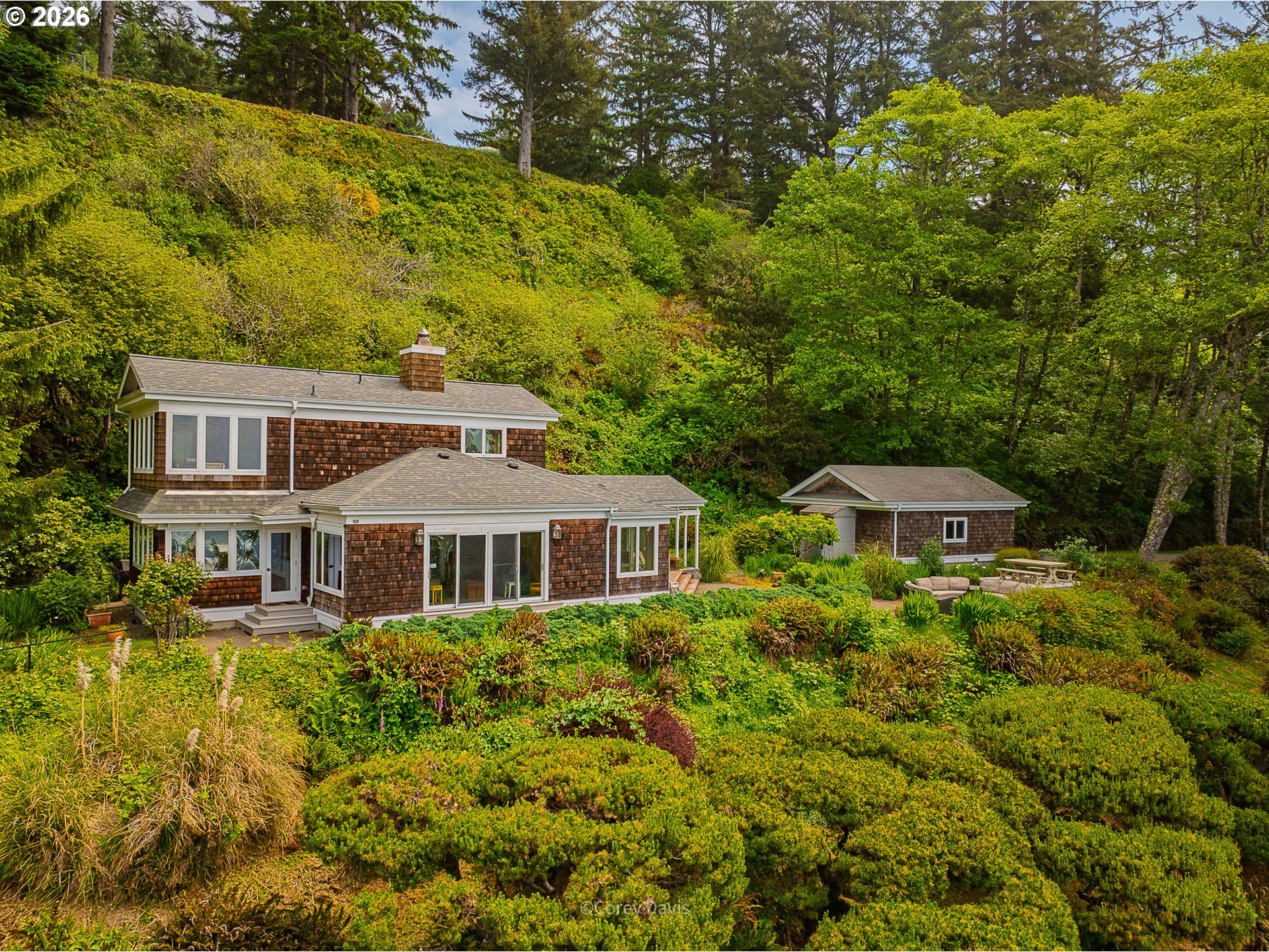 38295 Beulah Reed Road Nehalem, OR 97131 - Photo 3 of 42 a front view of a house with yard and green space