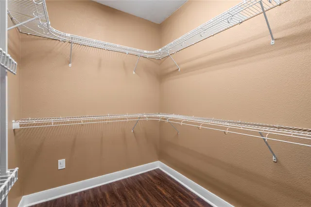 a view of a room with racks on the wall