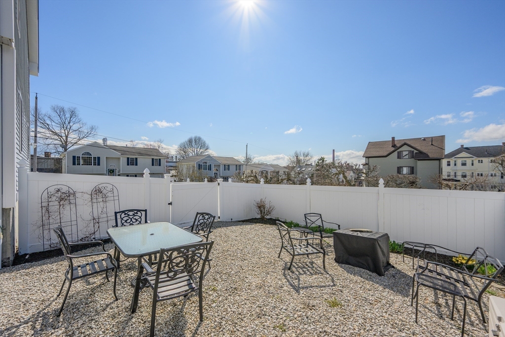 138 Sprague Street Fall River, MA 02724 - Photo 26 of 34 a terrace of a house with outdoor seating