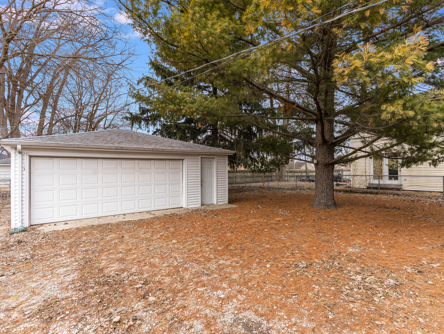 16202 St Louis Avenue Markham, IL 60428 - Photo 17 of 18 a view of backyard and garage