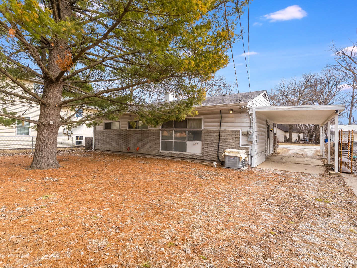 16202 St Louis Avenue Markham, IL 60428 - Photo 18 of 18 a view of a house with a yard