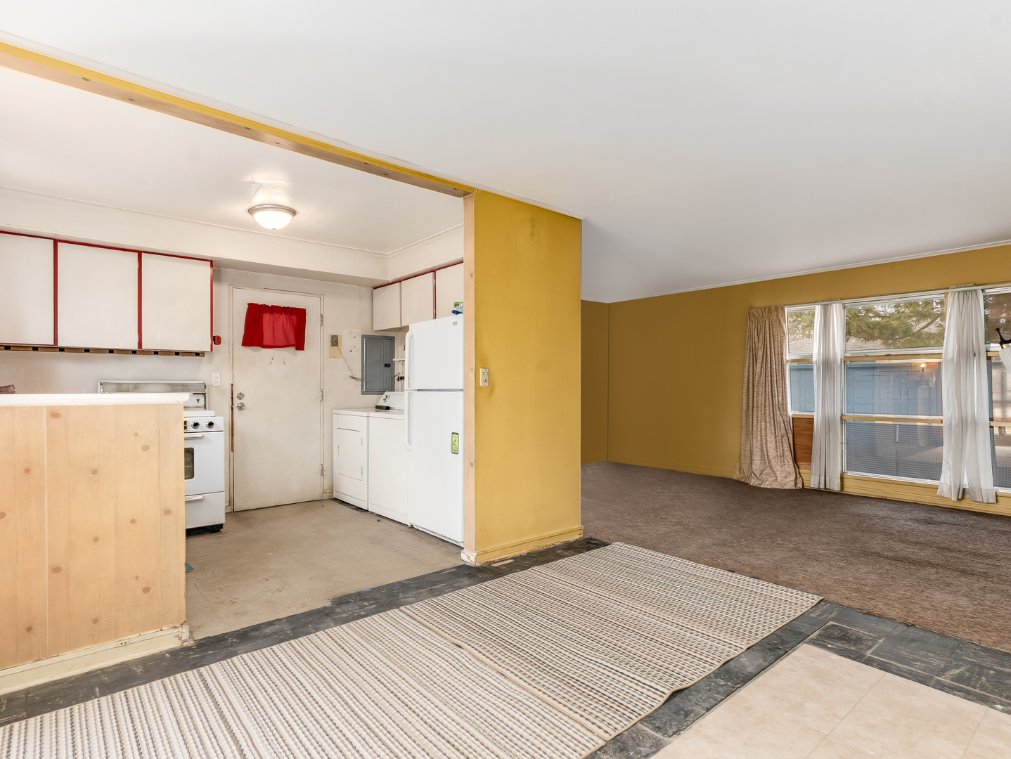 16202 St Louis Avenue Markham, IL 60428 - Photo 2 of 18 a view of a kitchen with fridge and wooden floor