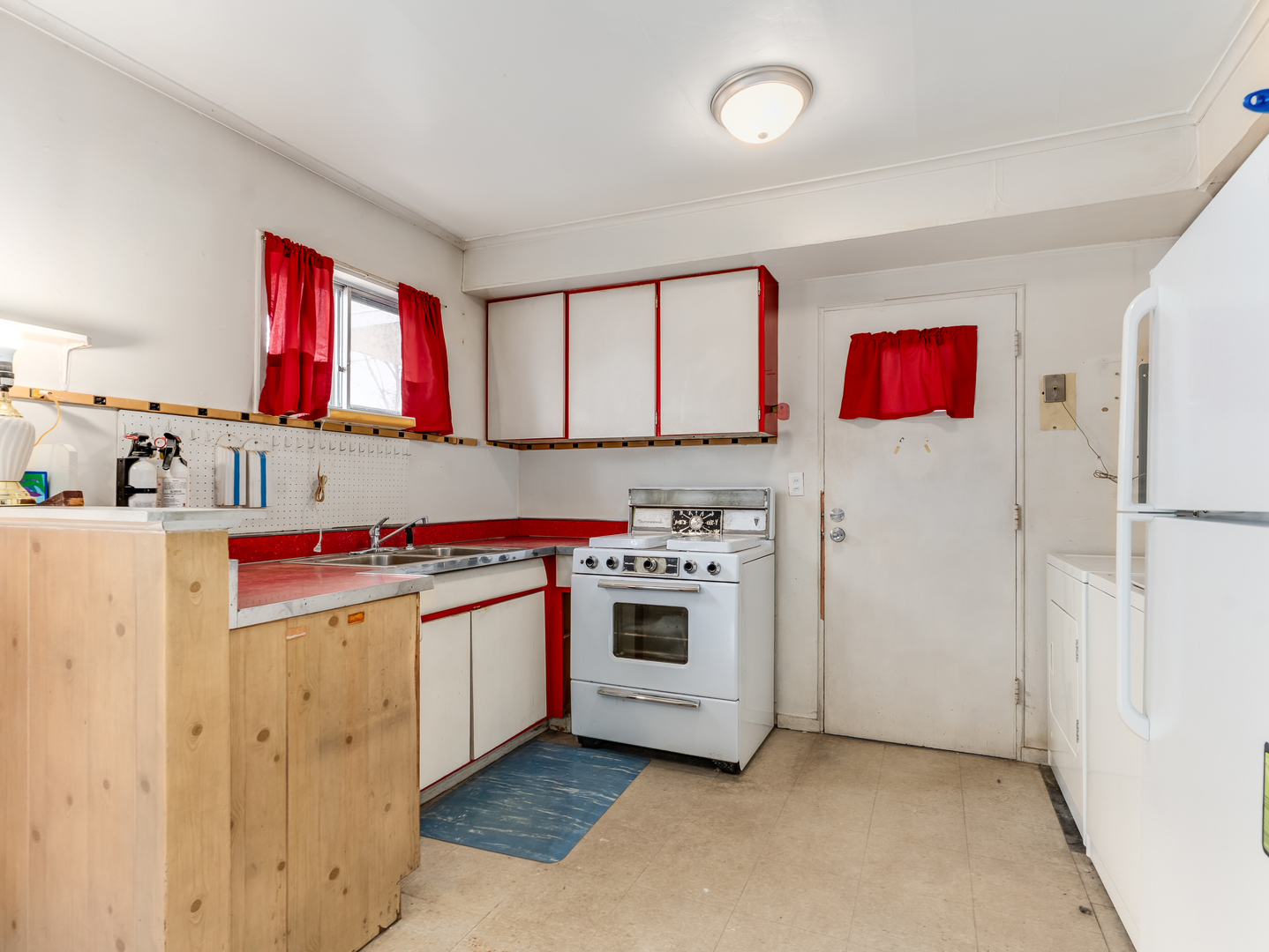 16202 St Louis Avenue Markham, IL 60428 - Photo 5 of 18 a kitchen with stainless steel appliances granite countertop a stove and a refrigerator