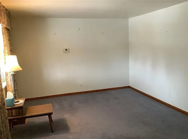 a view of a room with a bench