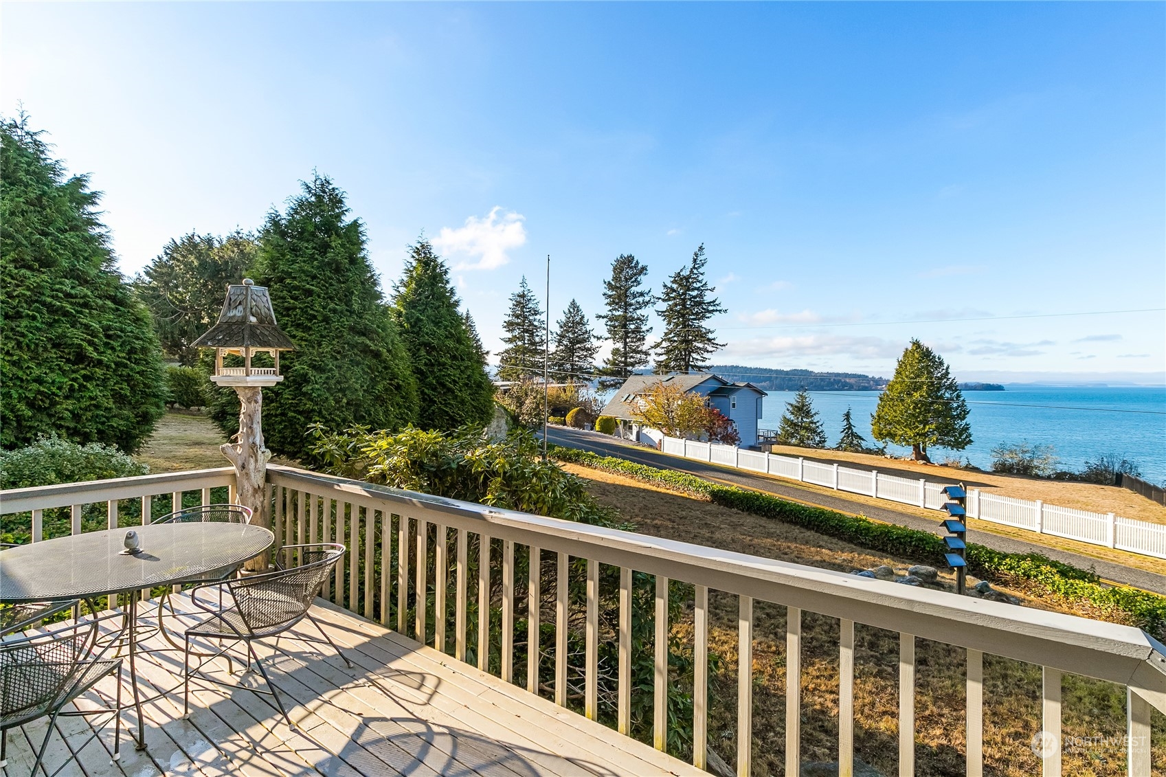 3376 Northgate Road Bellingham, WA 98226 - Photo 1 of 38 a view of a roof deck with wooden fence and floor