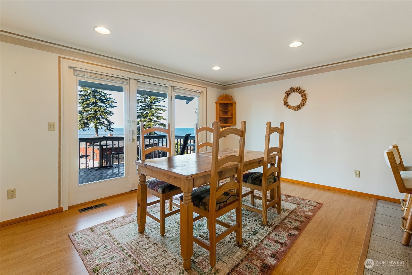 3376 Northgate Road Bellingham, WA 98226 - Photo 13 of 38 a view of a dining room with furniture and wooden floor