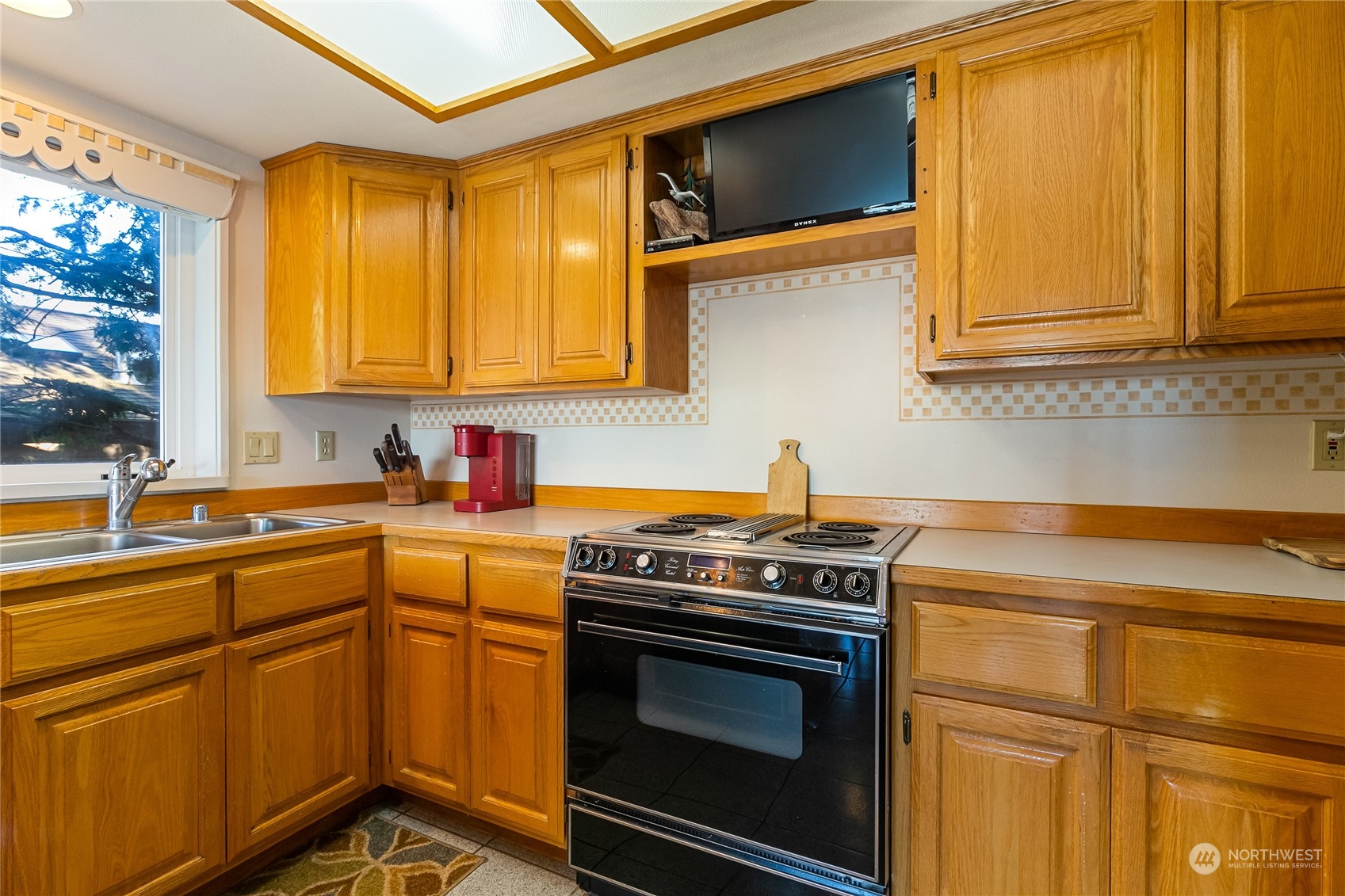 3376 Northgate Road Bellingham, WA 98226 - Photo 15 of 38 a kitchen with stainless steel appliances granite countertop cabinets and a sink