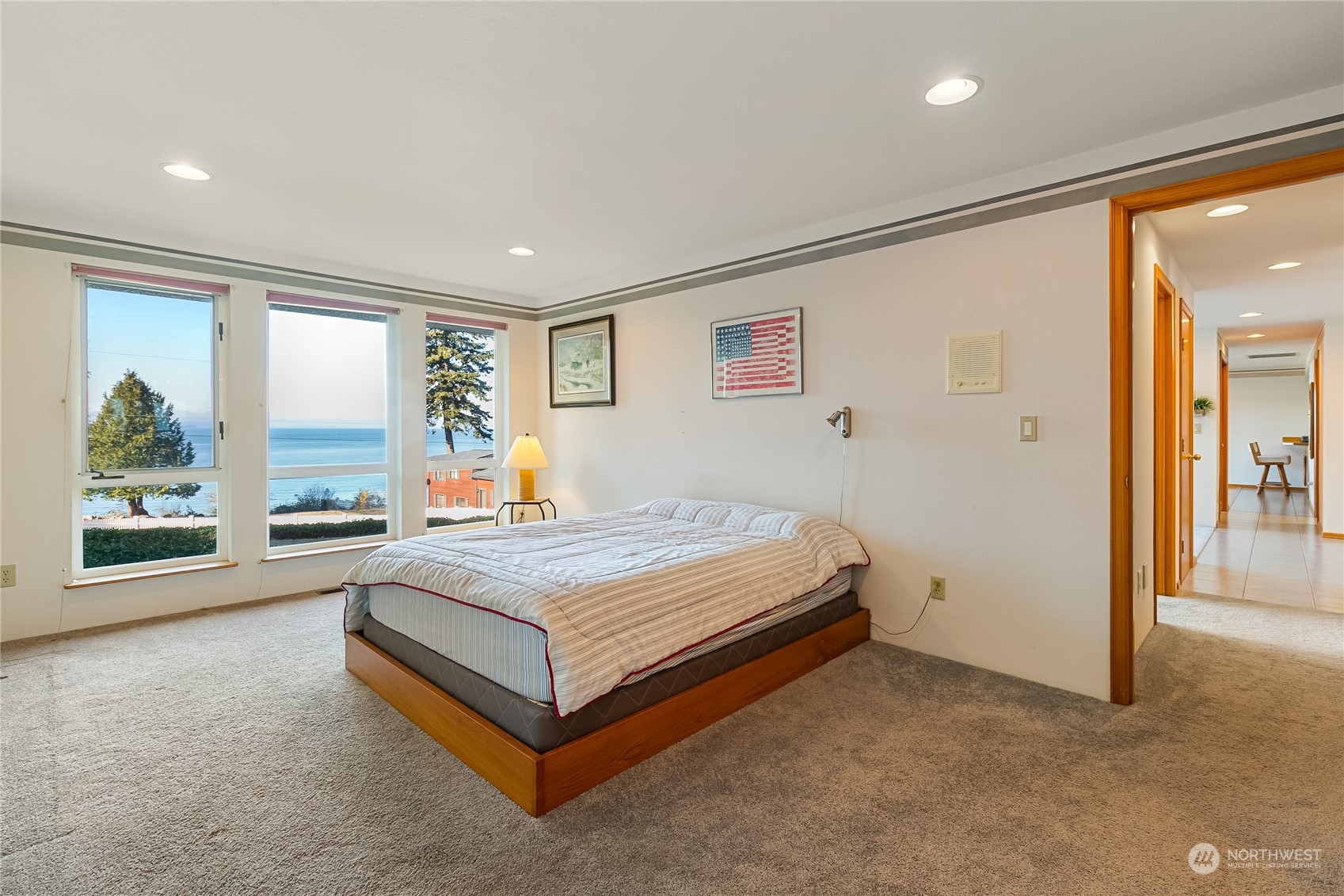 3376 Northgate Road Bellingham, WA 98226 - Photo 16 of 38 a spacious bedroom with a bed and large windows