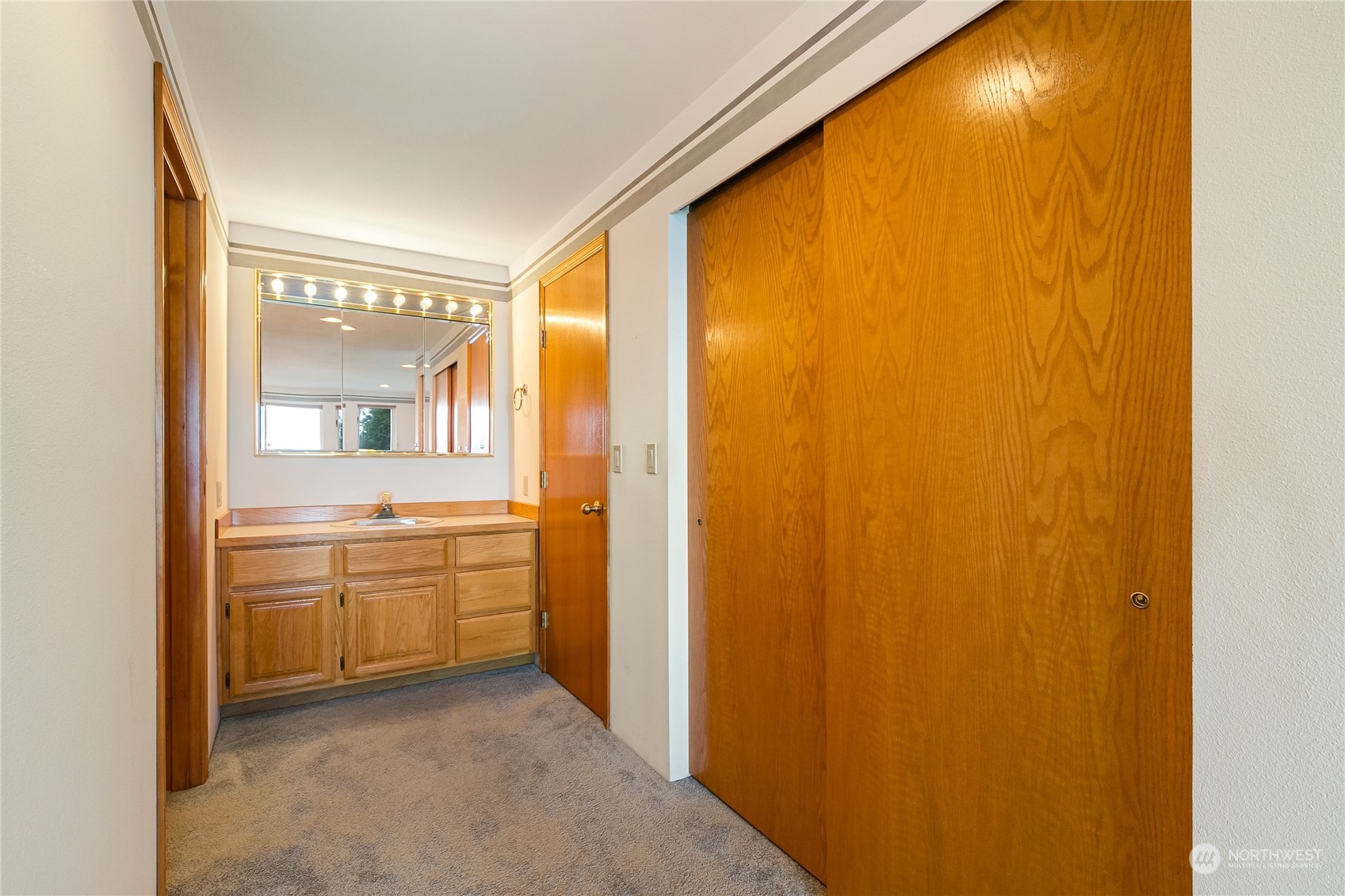 3376 Northgate Road Bellingham, WA 98226 - Photo 18 of 38 a bathroom with a granite countertop sink and a mirror