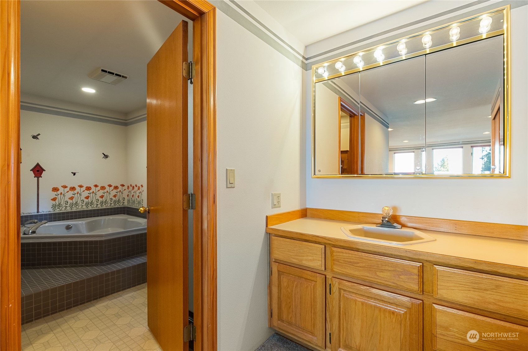 3376 Northgate Road Bellingham, WA 98226 - Photo 19 of 38 a bathroom with a sink and a mirror