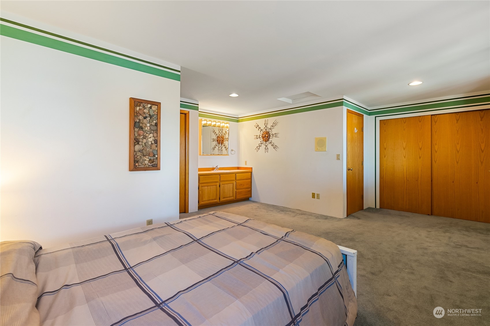 3376 Northgate Road Bellingham, WA 98226 - Photo 26 of 38 a spacious bedroom with a large bed and a window