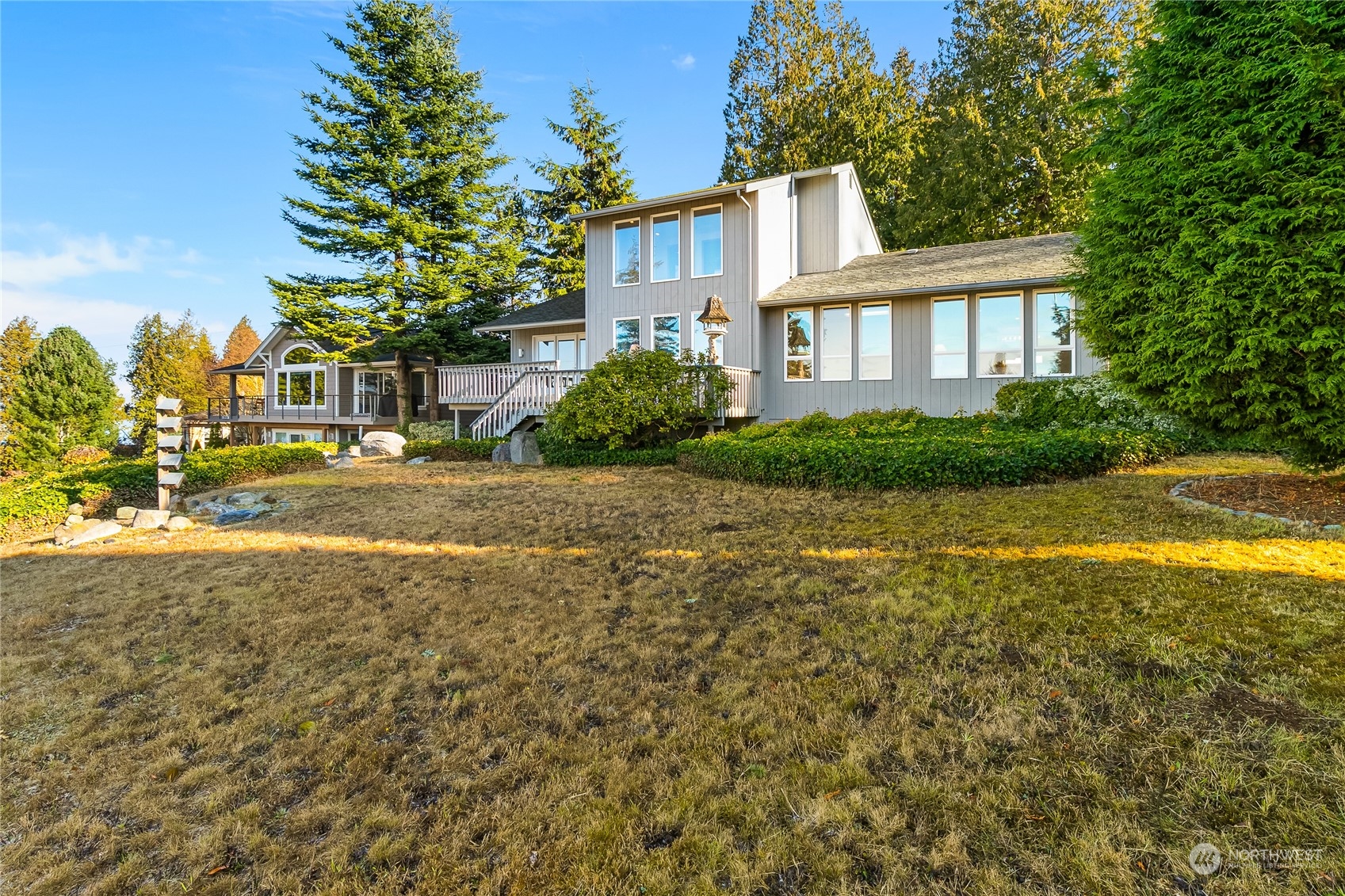 3376 Northgate Road Bellingham, WA 98226 - Photo 29 of 38 a front view of a house with a yard and trees
