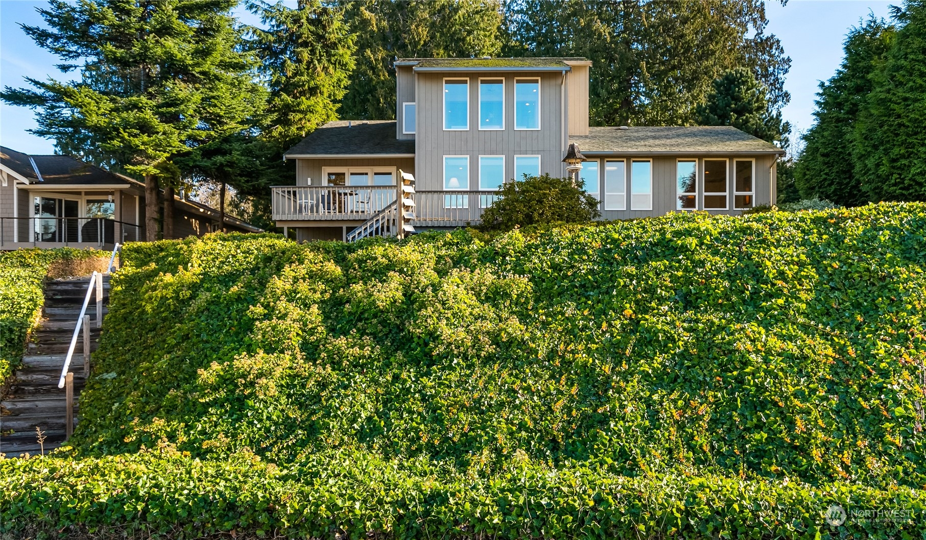 3376 Northgate Road Bellingham, WA 98226 - Photo 3 of 38 a front view of a house with a yard and potted plants