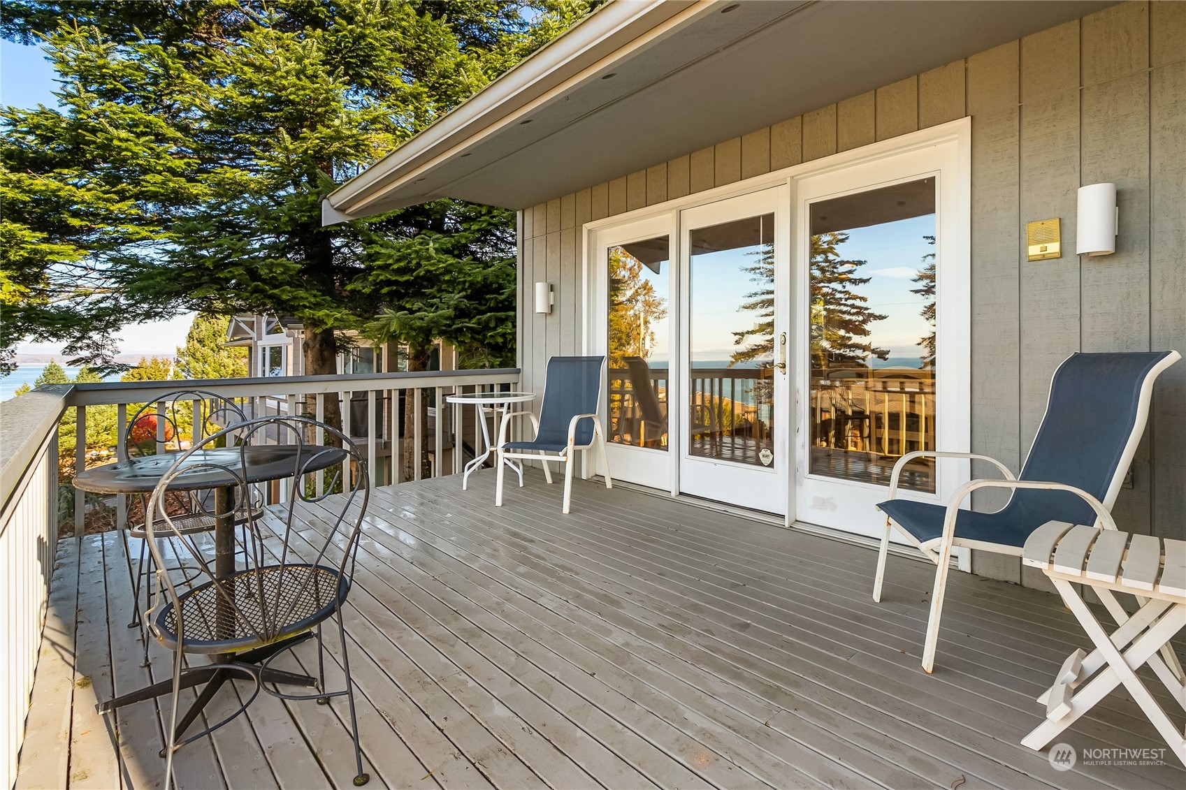 3376 Northgate Road Bellingham, WA 98226 - Photo 32 of 38 a view of a patio with a table chairs and wooden floor