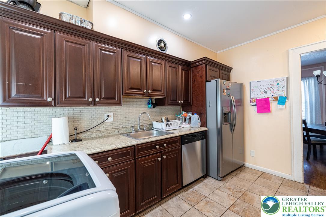 118 South 3rd Street Bangor, PA 18013 - Photo 7 of 33 A well-appointed kitchen features ample cabinetry, modern appliances, and a convenient layout.