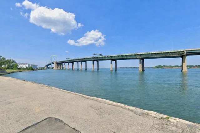 a view of swimming pool with seating area