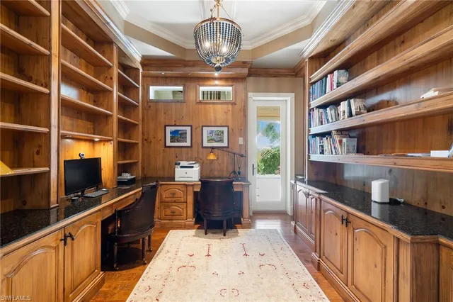 a kitchen with stainless steel appliances granite countertop a refrigerator and a stove