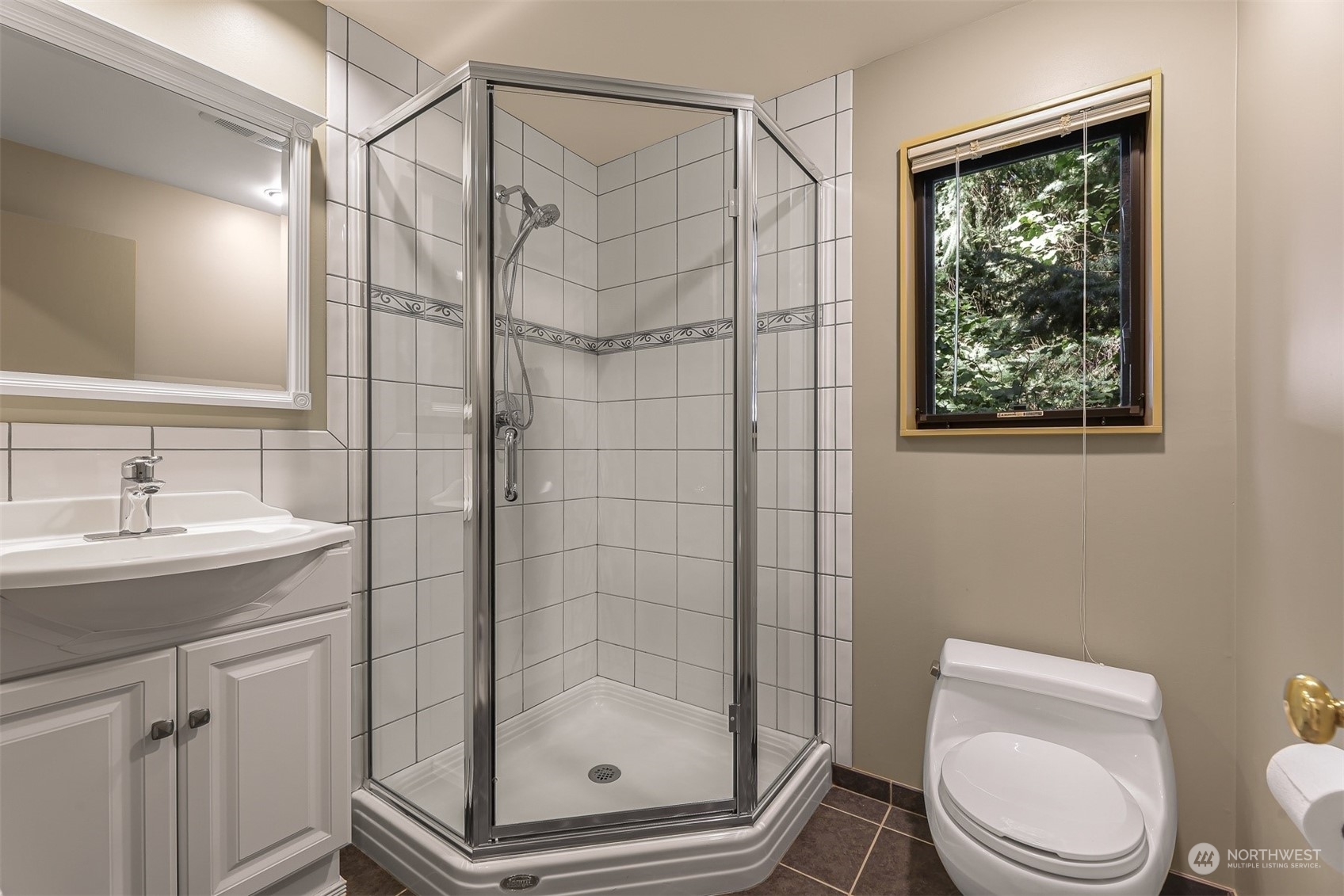 4431 Ferncroft Road Mercer Island, WA 98040 - Photo 24 of 40 a bathroom with a shower a toilet and sink