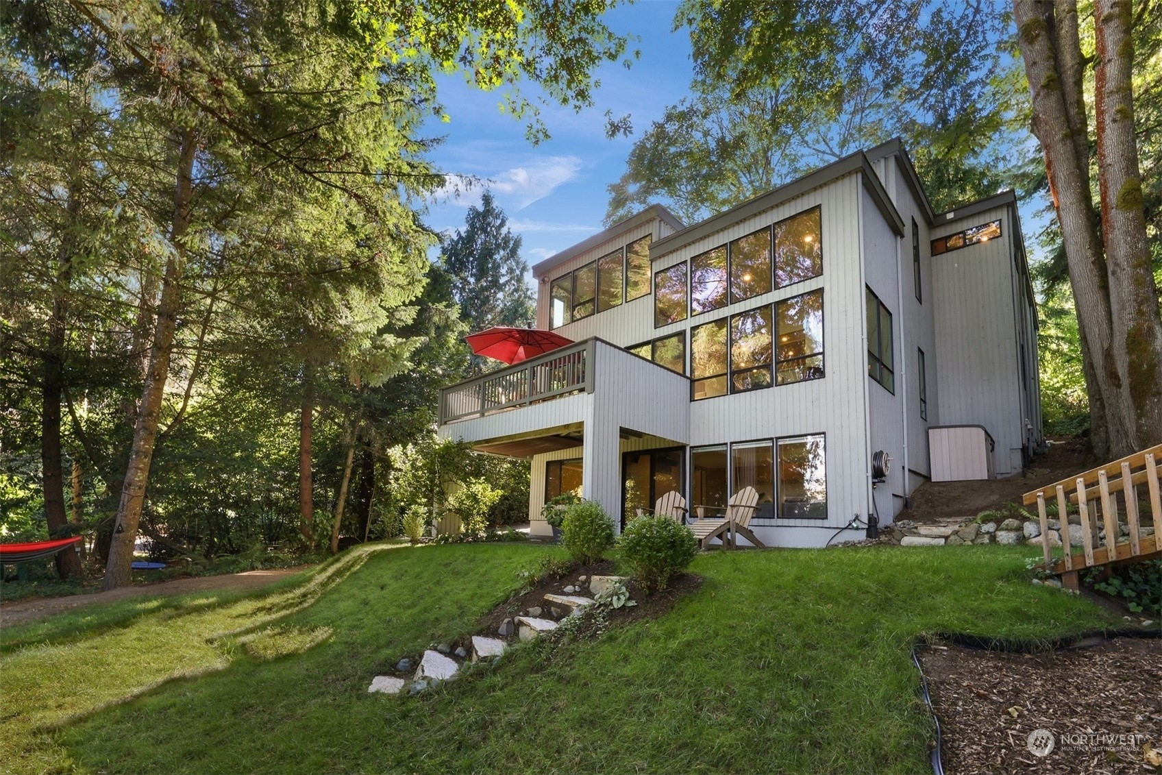 4431 Ferncroft Road Mercer Island, WA 98040 - Photo 38 of 40 a view of a building with a yard