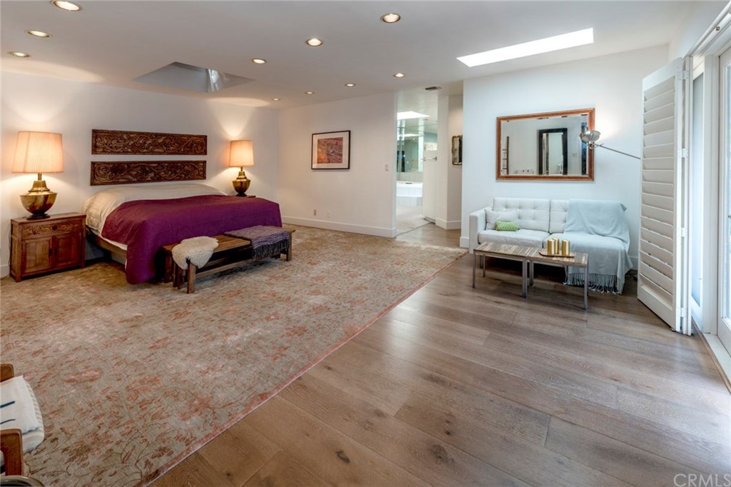 1425 Miramar Drive Fullerton, CA 92831 - Photo 18 of 55 a spacious bedroom with a bed and wooden floor