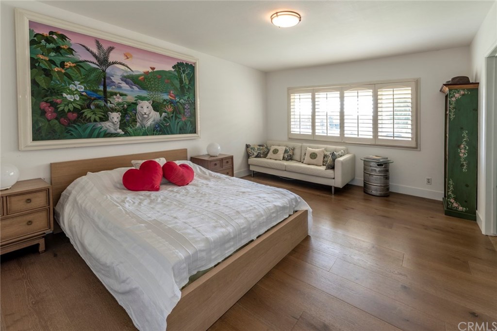 1425 Miramar Drive Fullerton, CA 92831 - Photo 24 of 55 a bedroom with a bed and wooden floor