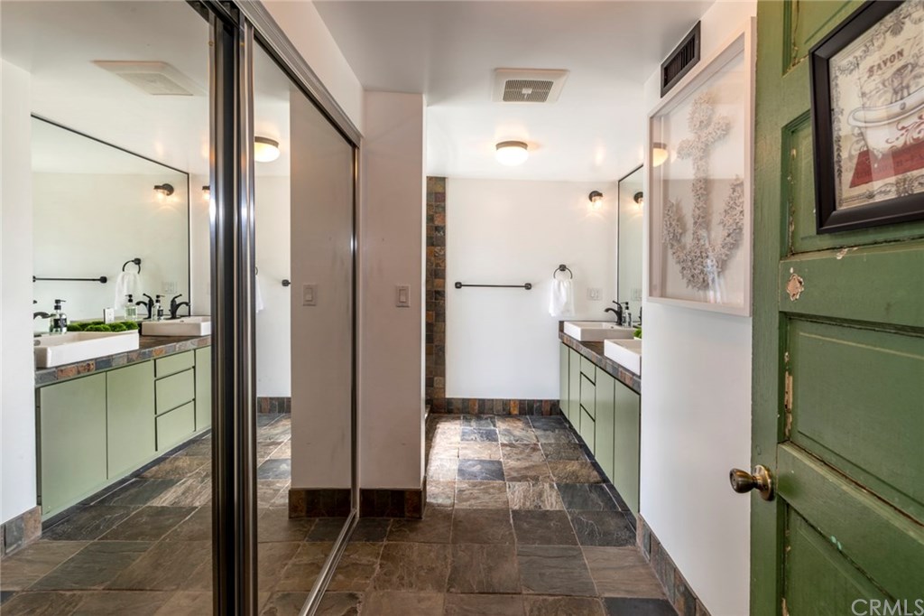 1425 Miramar Drive Fullerton, CA 92831 - Photo 32 of 55 a bathroom with a sink and a mirror