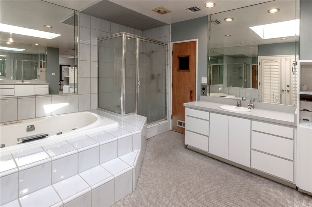 1425 Miramar Drive Fullerton, CA 92831 - Photo 44 of 55 a spacious bathroom with a double vanity sink mirror and double