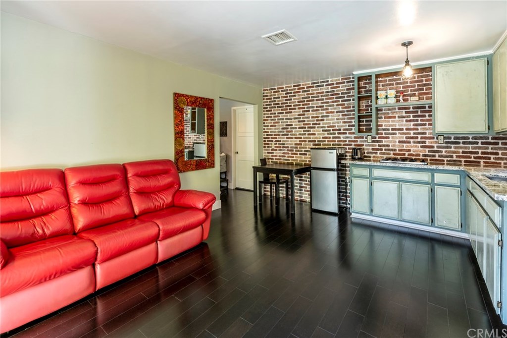 1425 Miramar Drive Fullerton, CA 92831 - Photo 48 of 55 a living room with furniture and wooden floor