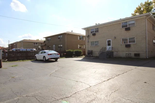 a car parked in front of a house