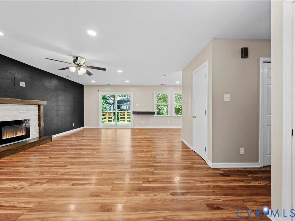 1430 Lockett Ridge Road Midlothian, VA 23114 - Photo 5 of 33 Unfurnished living room featuring a fireplace, rec