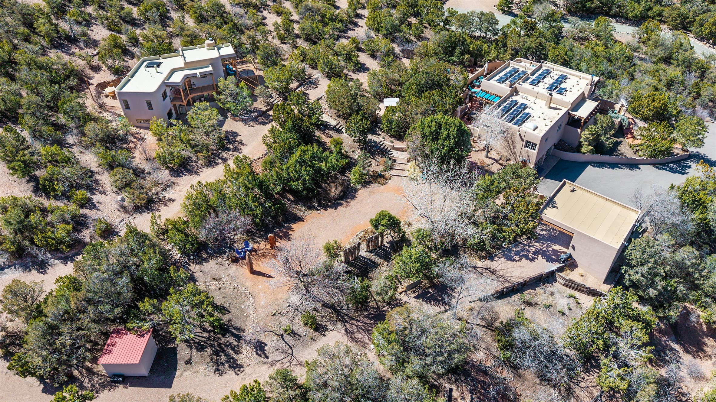 1204 Bandolina Road Santa Fe, NM 87501 - Photo 56 of 69 Casita in upper left, main house and carport on right, storage shed in lower left