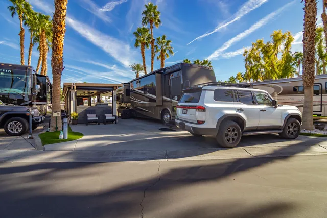 a view of a cars parked on the side of a street