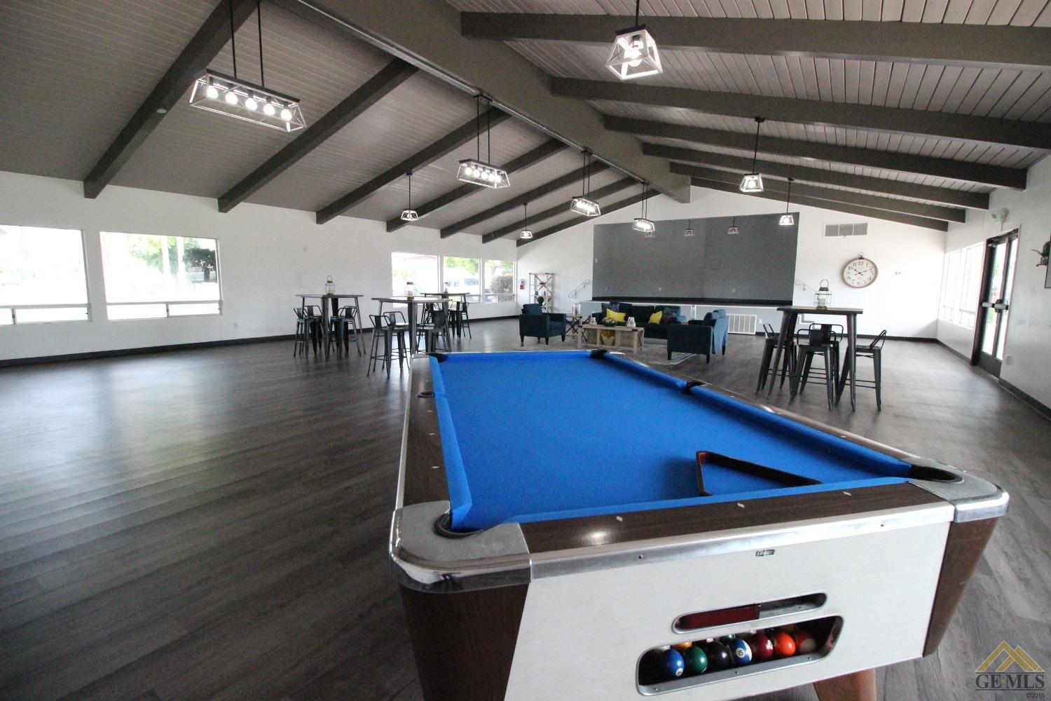 Undisclosed Address Bakersfield, CA 93308 - Photo 21 of 25 a view of a room with gym equipment