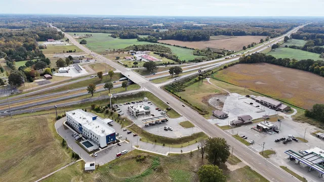 an aerial view of a house with a garden