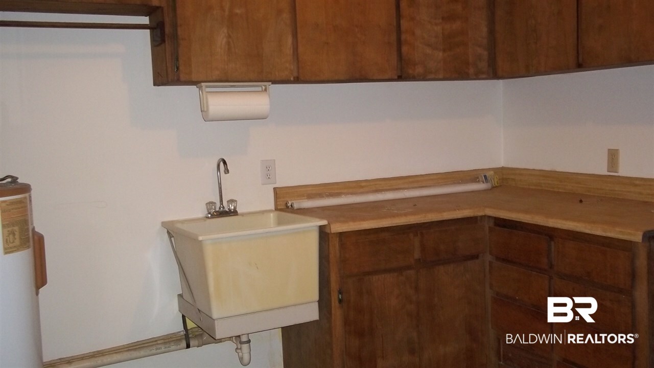 9530 Soldier Creek Road Lillian, AL 36549 - Photo 9 of 11 Utility room
