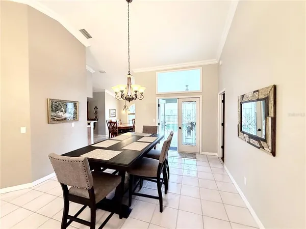 a view of a dining room with furniture
