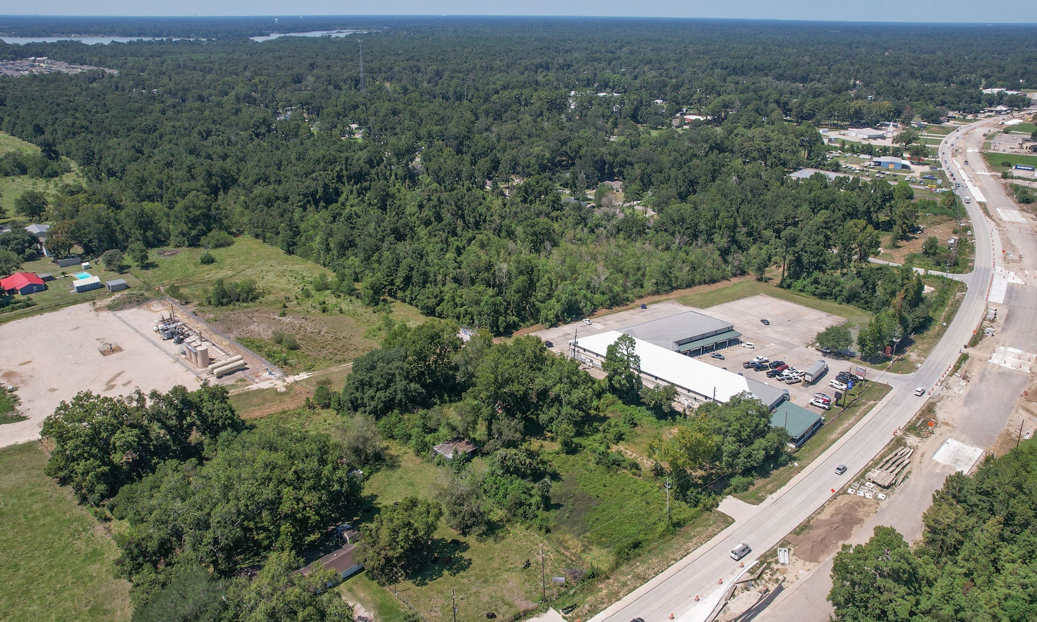 24411 Farm To Market 2100 Huffman, TX 77336 - Photo 13 of 18 an aerial view of a house with a yard