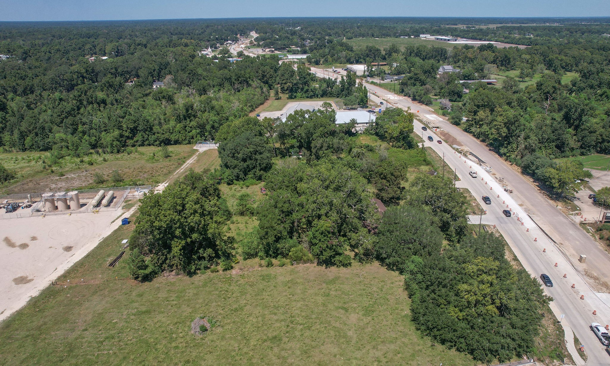 24411 Farm To Market 2100 Huffman, TX 77336 - Photo 14 of 18 an aerial view of residential houses with outdoor space and trees