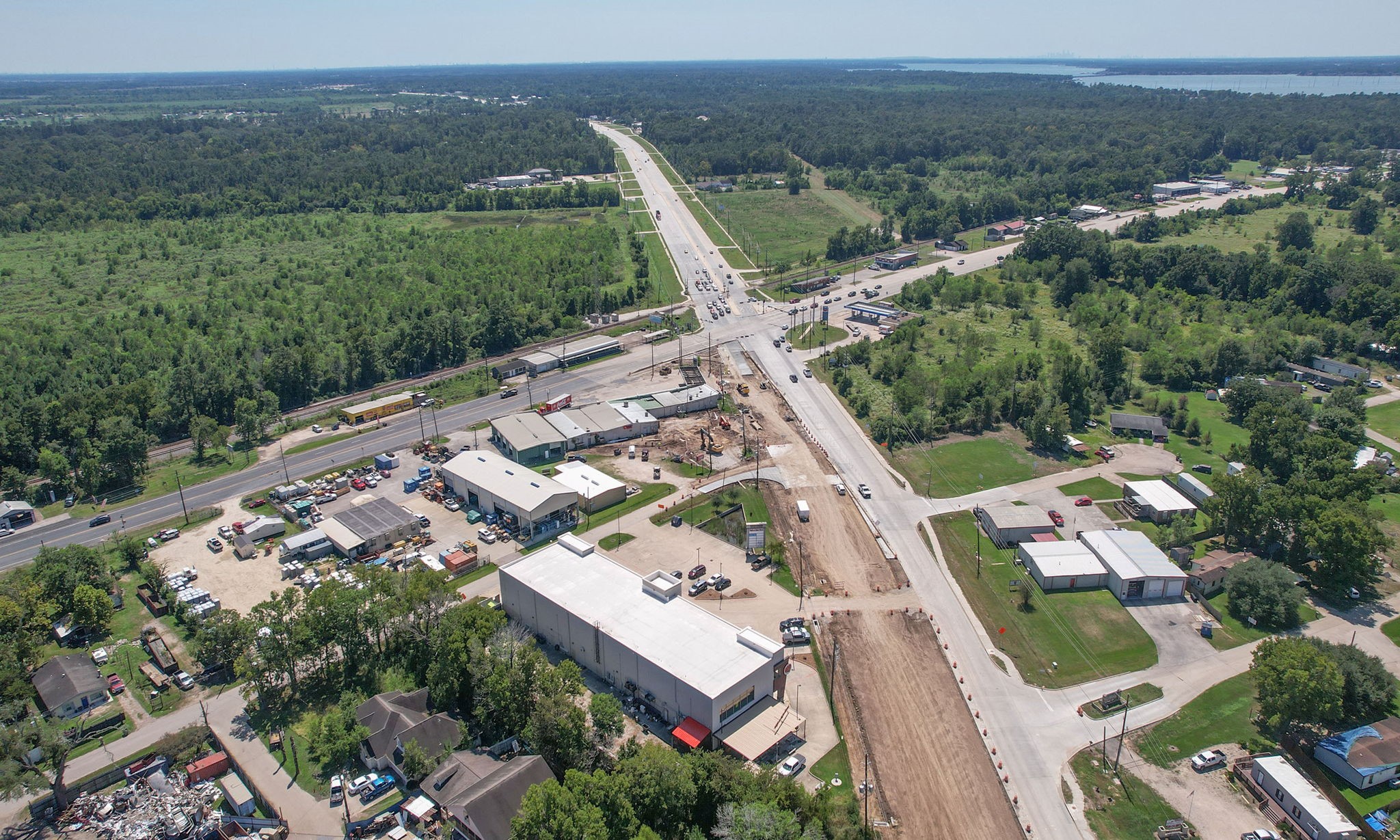 24411 Farm To Market 2100 Huffman, TX 77336 - Photo 16 of 18 an aerial view of a house with a yard