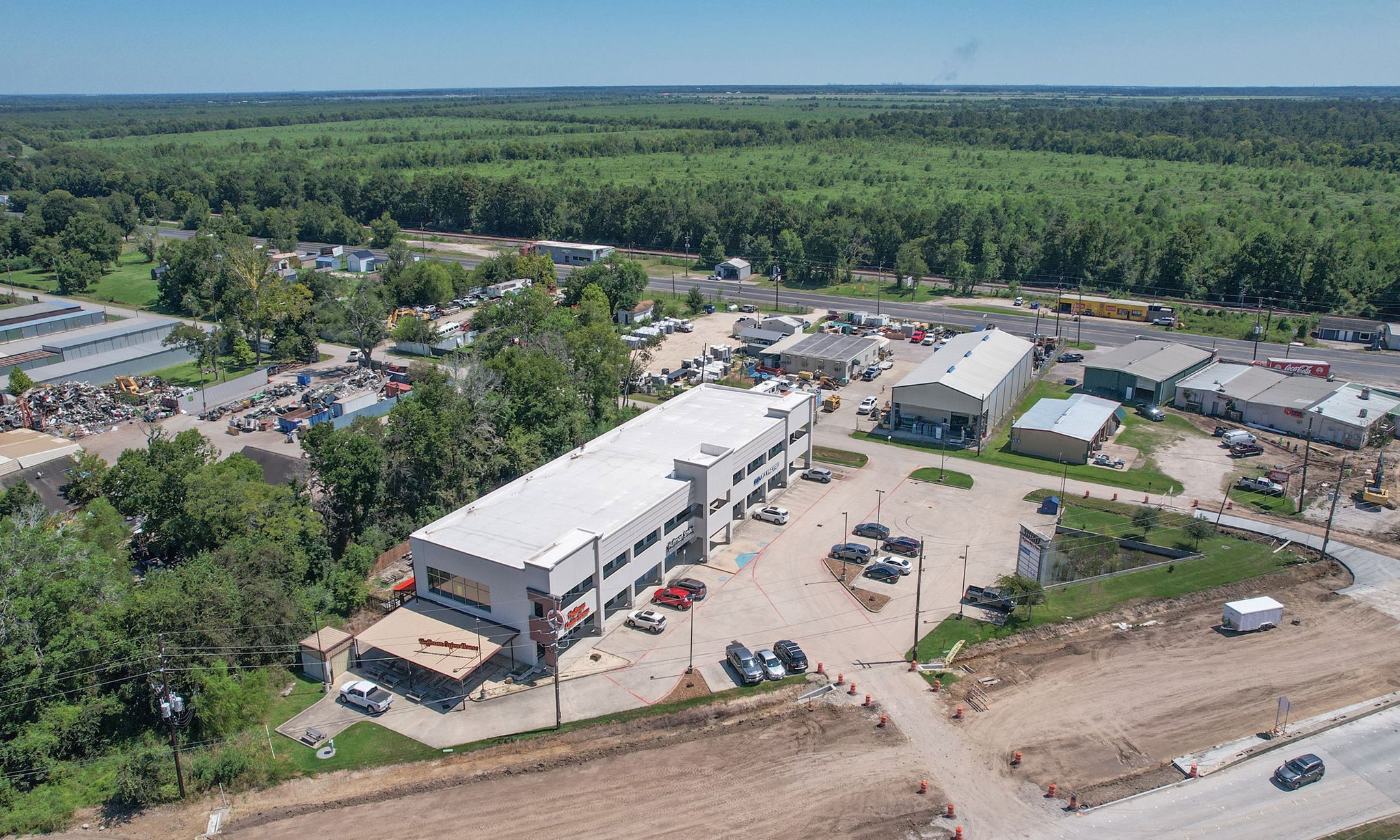 24411 Farm To Market 2100 Huffman, TX 77336 - Photo 17 of 18 an aerial view of a house with outdoor space