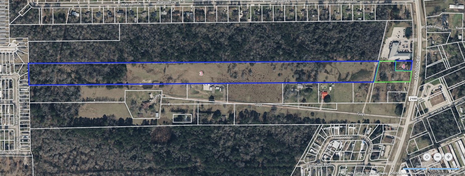 24411 Farm To Market 2100 Huffman, TX 77336 - Photo 2 of 18 a view of a room with wooden wall