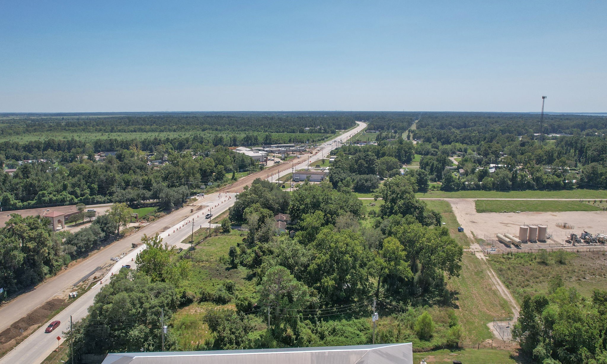 24411 Farm To Market 2100 Huffman, TX 77336 - Photo 3 of 18 an aerial view of a residential houses with outdoor space and street view
