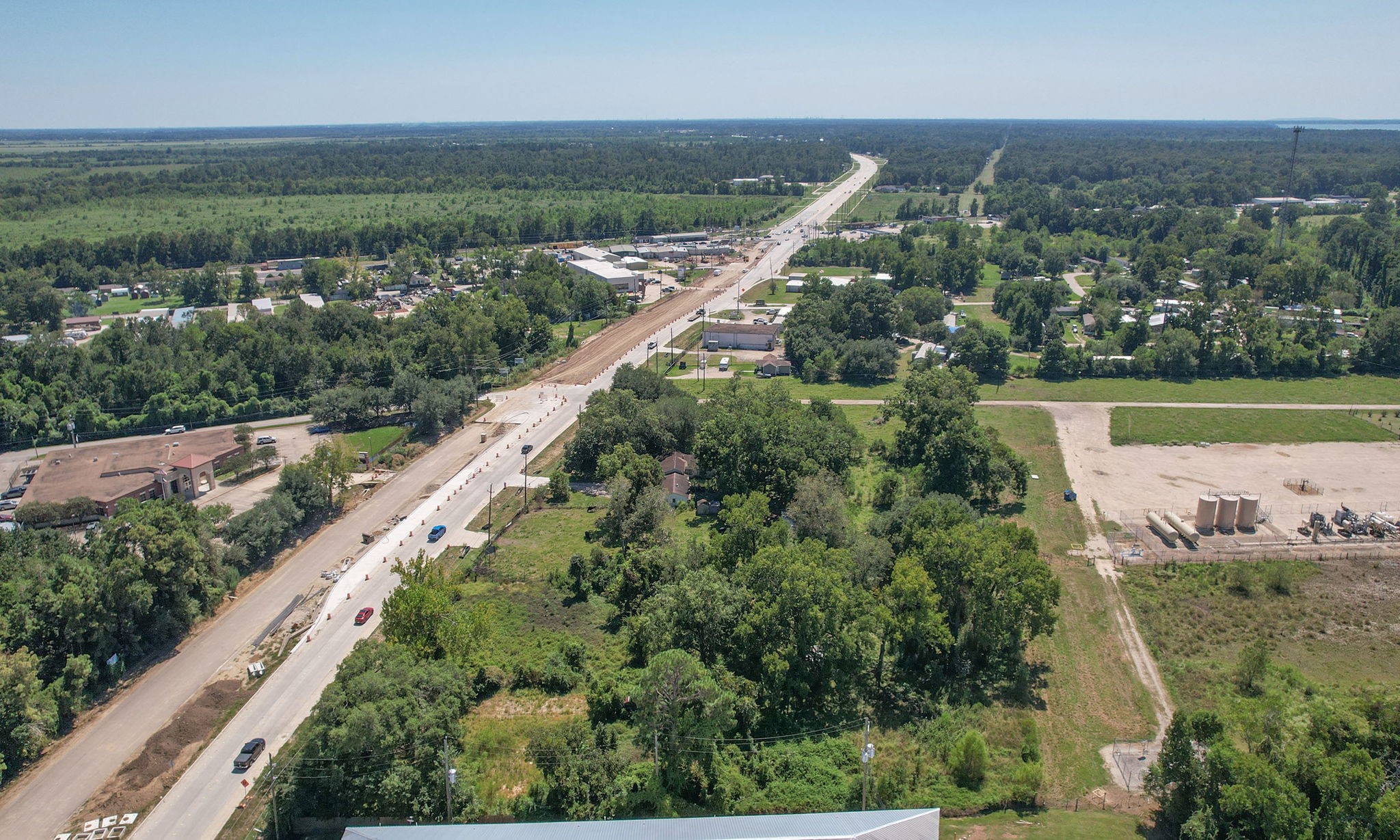 24411 Farm To Market 2100 Huffman, TX 77336 - Photo 4 of 18 an aerial view of a city